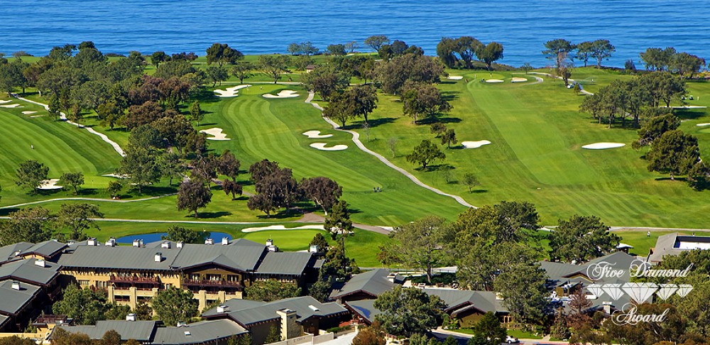 Aerial of lodge, golf course and ocean